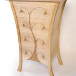 'Sapling' drawers - sycamore featuring relief carved and oil painted design