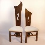 Dining chairs - walnut with leather. £750 each