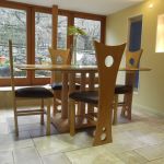 'Torres' dining chairs in maple.